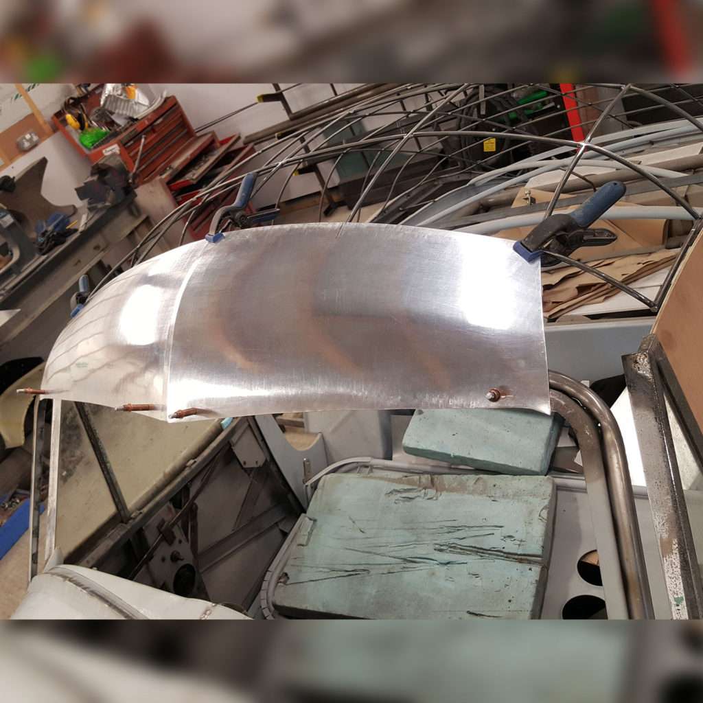 We've started the aluminium sheet work on the 1953 Jowett Jupiter, which involves cutting flat sheet, English wheeling, welding and finishing it off. It's amazing to see the skill that goes into this process!