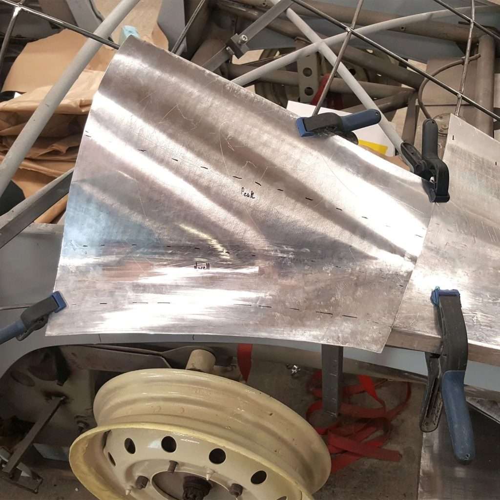 With the 1953 Jowett Jupiter we're using Superleggera methods to shape the metal, ensuring perfect form and consistency. Once satisfied with the wire frame, we're moving on to the next stage: crafting the additional body using flat sheet aluminium.