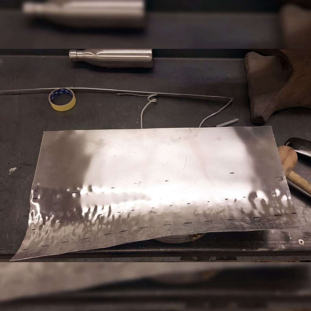 On the 1953 Jowett Jupiter we start by hammering the metal into a rough shape, before our skilled team uses a planishing hammer and English wheel to meticulously remove indentations and shape it flawlessly.