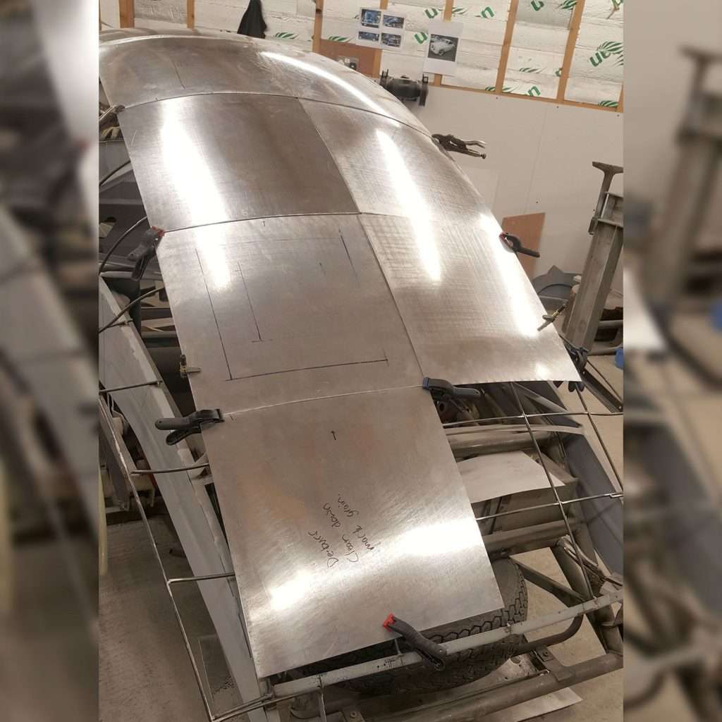 The 1953 Jowett Jupiter roof merging into the back is taking shape, gracefully bringing together the stylish fastback silhouette.