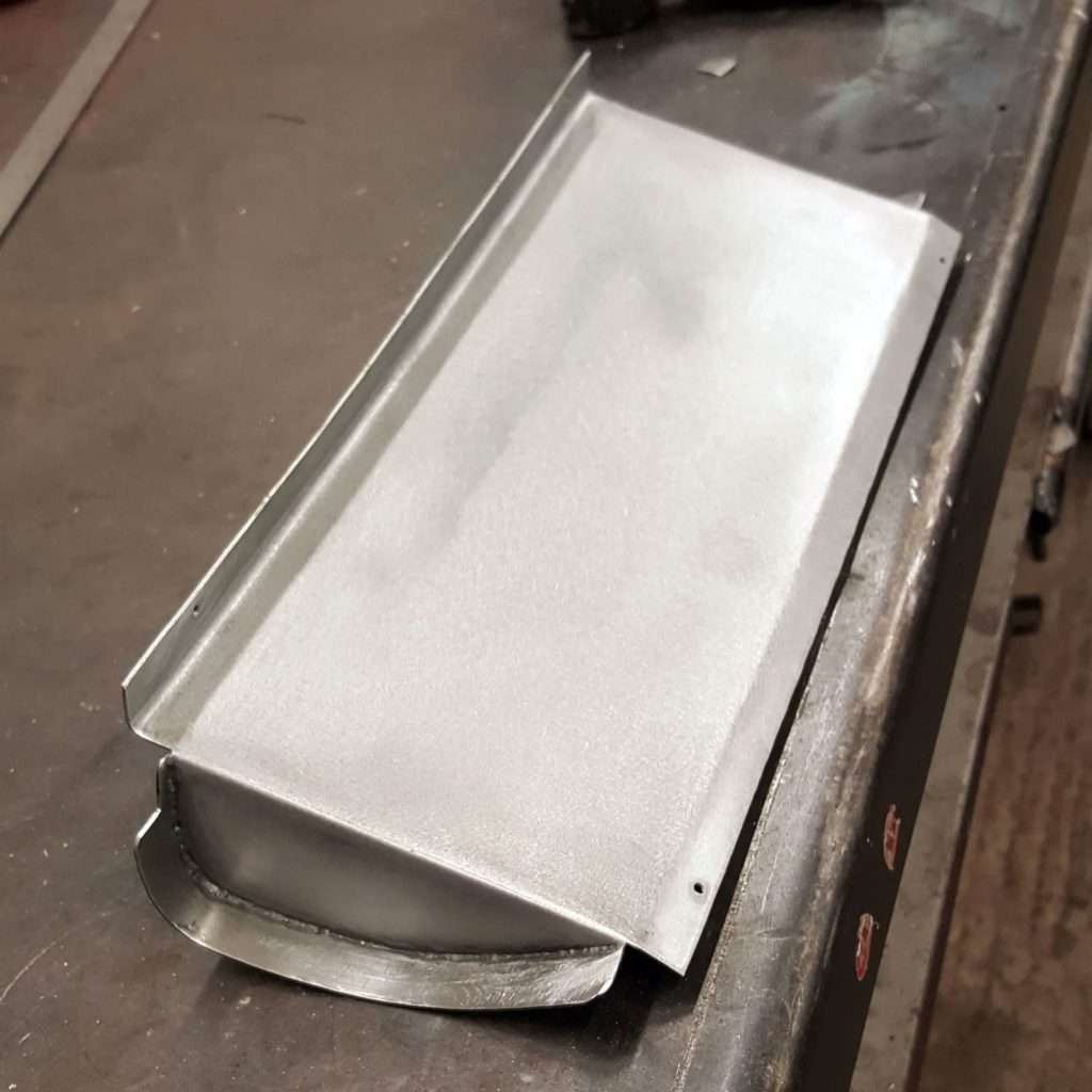 The finished oil cooler support bracket on the Plastics4Performance 1969 Mini Cooper 998 MkII is a thing of beauty. A complex piece that shows the efforts we go to on even the simplest parts.