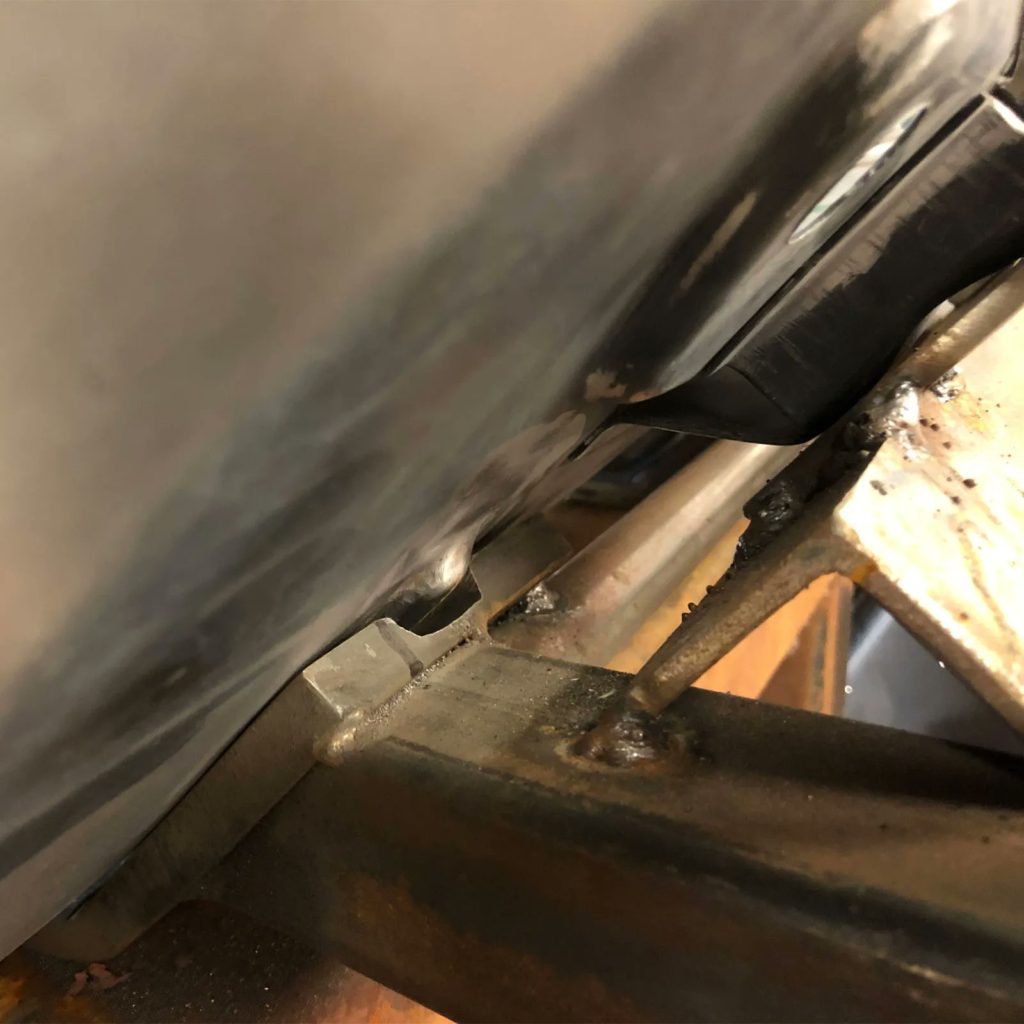 When it comes to the Plastics4Performance Mini Cooper 998 MkII, the devil is in the detail. Original missing pressings are put in location near the steering rack.