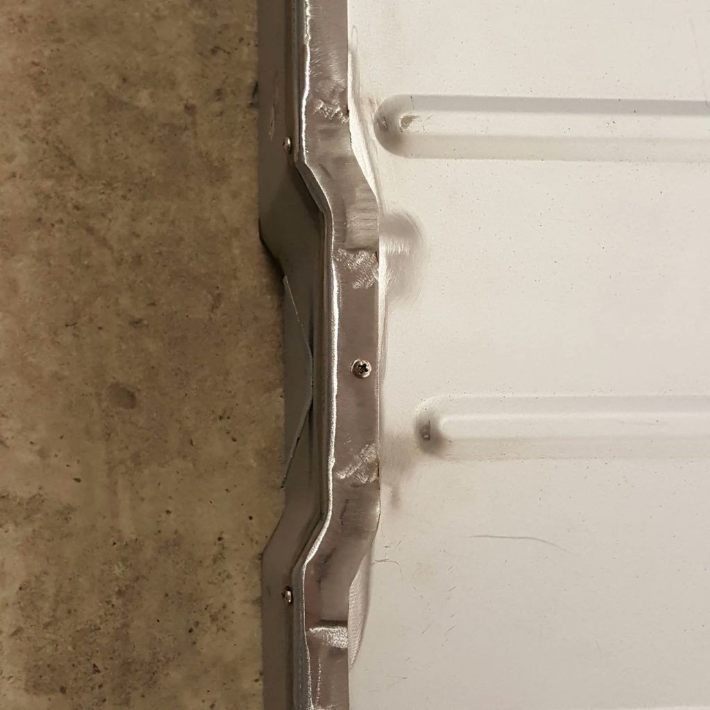 Modifying the rear floor board on the Plastics4Performance Mini Cooper 998 MkII. After this, it fit the floor much better!