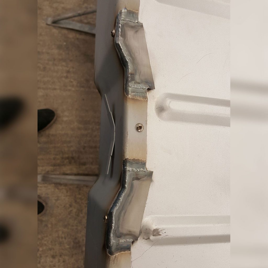 Modifying the rear floor board on the Plastics4Performance Mini Cooper 998 MkII. After this, it fit the floor much better!