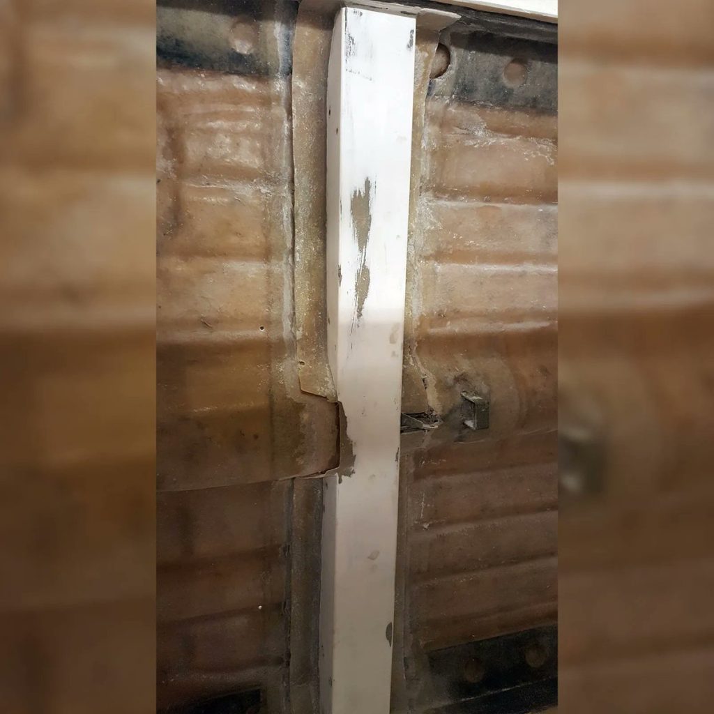 This crossmember on the Hawk Mini Sprint had been laminated onto gel coat and was not done very neatly. We removed the lamination, reduced size of flange and re-glass in for a much better result.
