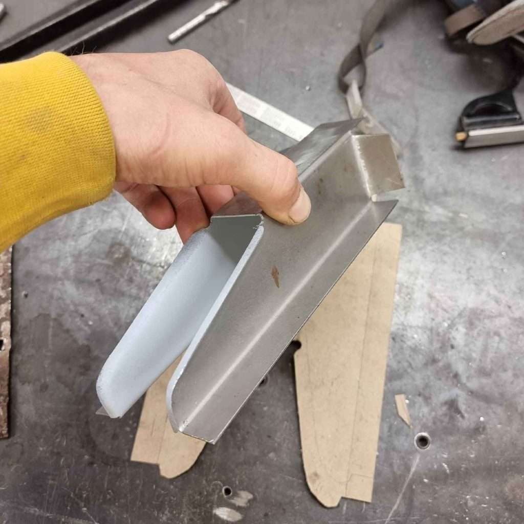 Introducing Cardboard Assisted Design and Manufacturing to our Ford Capri Mk3 project. We're taking precision to the next level by re-creating a factory panel using this ingenious technique.