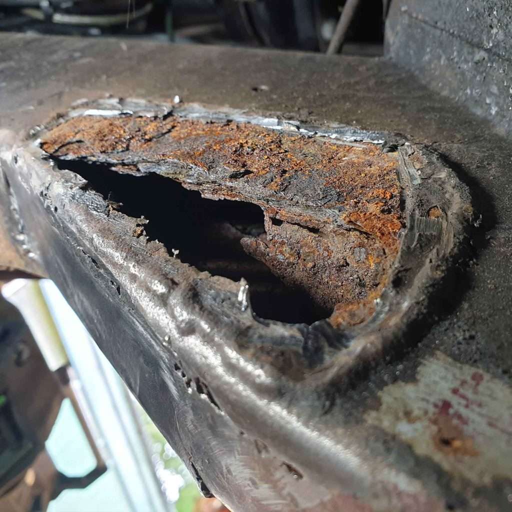 Behold these sizeable rust holes on our Ford Capri Mk3 project. Time to bid them adieu and usher in a new era of restoration.